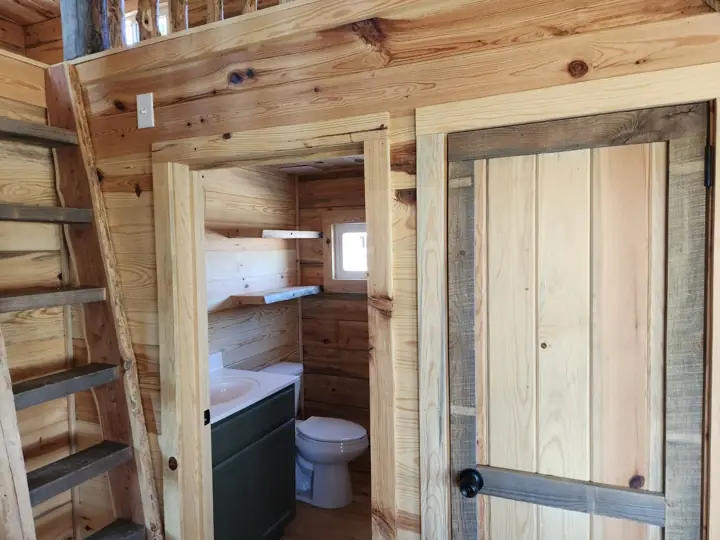 Bath and storage area with shelving