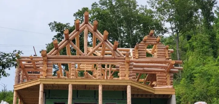 Log gable and roof framing on a large build